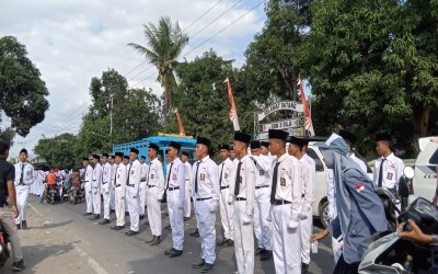 Siswa-Siswi Sekolah Menengah Atas PGRI 1 Berpartisipasi dalam Gerak Jalan Indah tingkat SMA/SMK